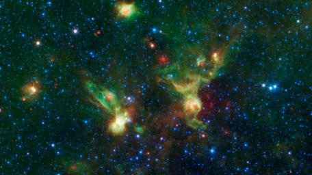 These nebulae seen by NASA's Spitzer Space Telescope, display two regions of star formation that are hidden behind a haze of dust when viewed in visible light, known officially y their catalog numbers, IRAS 19340+2016 and IRAS19343+2026.