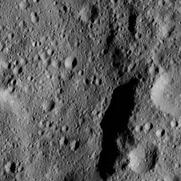 This view from NASA's Dawn spacecraft shows part of Kaikara Crater (45 miles, 72 kilometers wide) on Ceres. The image is centered at 41 degrees north latitude, 226 degrees east longitude.