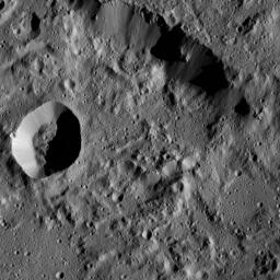 NASA's Dawn spacecraft captures part of the northern rim of Urvara Crater (101 miles, 163 kilometers wide). obtained on June 2, 2016, from its low-altitude mapping orbit, at a distance of about 240 miles (385 kilometers) above the surface.