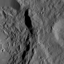 This image from NASA's Dawn spacecraft shows a portion of Ikapati Crater on Ceres. Dawn took this image on June 10, 2016, from its low-altitude mapping orbit, at a distance of about 240 miles (385 kilometers) above the surface.