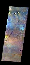 The THEMIS camera contains 5 filters. The data from different filters can be combined in multiple ways to create a false color image. This image from NASA's 2001 Mars Odyssey spacecraft shows part of the plains of Terra Sirenum near Sirenum Fossae.
