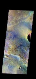 The THEMIS camera contains 5 filters. The data from different filters can be combined in multiple ways to create a false color image. This image from NASA's 2001 Mars Odyssey spacecraft shows part of the floor of Antoniadi Crater.