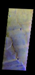 The THEMIS camera contains 5 filters. The data from different filters can be combined in multiple ways to create a false color image. This image from NASA's 2001 Mars Odyssey spacecraft shows part of Syrtis Major Planum.