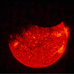 NASA's Solar Dynamics Observatory (SDO) saw both the Moon (upper right) and the Earth (upper left) partially block the sun (Sept. 1, 2016 at 7:33 UT). Just before this image was taken, the Earth totally blocked the sun for a while.