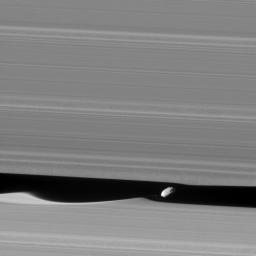 The wavemaker moon, Daphnis, is featured in this view, taken as NASA's Cassini spacecraft made one of its ring-grazing passes over the outer edges of Saturn's rings on Jan. 16, 2017. This is the closest view of the small moon obtained yet.