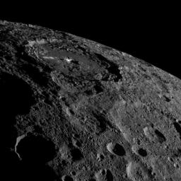 Occator Crater, home of Ceres' intriguing brightest areas, is prominently featured in this image from NASA's Dawn spacecraft.