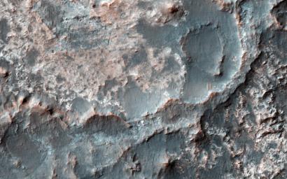 This image captured by NASA's Mars Reconnaissance Orbiter shows a transition from depressed to inverted channels in the Gorgonum Basin.