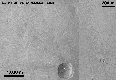 This image from NASA's Mars Reconnaissance Orbiter shows one of two spots that likely appeared in connection with the Oct. 19, 2016, arrival of ESA's Schiaparelli test lander. An animation is available at the Photojournal.