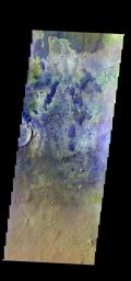 The THEMIS camera contains 5 filters. The data from different filters can be combined in multiple ways to create a false color image. This image from NASA's 2001 Mars Odyssey spacecraft shows part of the floor of Schiaparelli Crater.