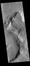 This image captured by NASA's 2001 Mars Odyssey spacecraft shows part of two unnamed craters in Noachis Terra.
