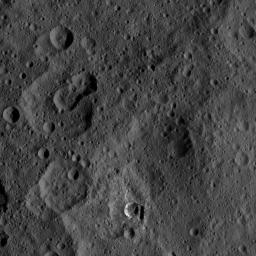 The small, bright crater Oxo on Ceres is featured in this image from NASA's Dawn spacecraft taken on Oct. 17, 2016. Oxo (6 miles, 10 kilometers in diameter) is located at mid-latitudes on Ceres and likely has water ice.