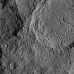 Ceres' Ezinu Crater is seen at top right in this image from NASA's Dawn spacecraft taken on Oct. 21, 2016. The crater features a network of canyon-like features.