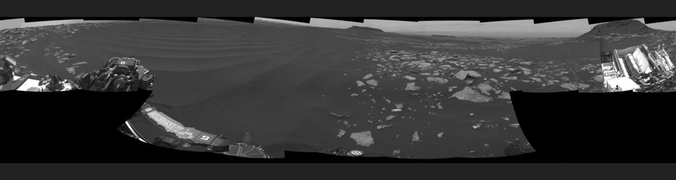 The left side of this 360-degree panorama from NASA's Curiosity Mars rover shows the long rows of ripples on a linear shaped dune in the Bagnold Dune Field on the northwestern flank of Mount Sharp.
