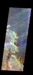 The THEMIS camera contains 5 filters. The data from different filters can be combined in multiple ways to create a false color image. This image from NASA's 2001 Mars Odyssey spacecraft shows several wind streaks in Syrtis Major Planum.