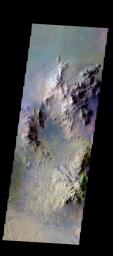 The THEMIS camera contains 5 filters. The data from different filters can be combined in multiple ways to create a false color image. This image from NASA's 2001 Mars Odyssey spacecraft shows part of the interior of Hale Crater.
