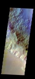 The THEMIS camera contains 5 filters. Data from different filters can be combined in multiple ways to create a false color image. This image from NASA's 2001 Mars Odyssey spacecraft shows part of the southwestern rim of Knobel Crater.