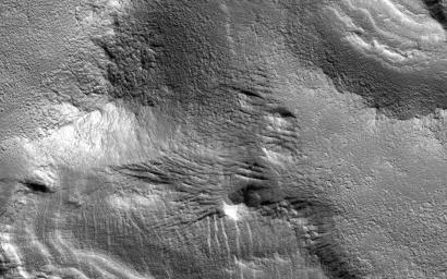 NASA's Mars Reconnaissance Orbiter sees ice-rich mantling deposits accumulate from the atmosphere in the Martian mid-latitudes in cycles during periods of high obliquity.