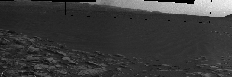 Beyond a dark sand dune closer to the rover, a Martian dust devil passes in front of the horizon in this frame from an animation from NASA's Curiosity Mars rover.