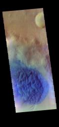 The THEMIS camera contains 5 filters. Data from different filters can be combined to create a false color image. This image from NASA's 2001 Mars Odyssey spacecraft shows a sand sheet with surface dune forms on an unnamed crater in Noachis Terrra.