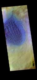 The THEMIS camera contains 5 filters. Data from different filters can be combined in many ways to create a false color image. This image from NASA's 2001 Mars Odyssey spacecraft shows the sand sheet with surface dune forms on the floor of Matara Crater.