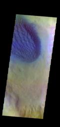 The THEMIS camera contains 5 filters. The data from different filters can be combined in multiple ways to create a false color image. This image from NASA's 2001 Mars Odyssey spacecraft shows part of the floor of Matara Crater.
