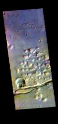The THEMIS camera contains 5 filters. The data from different filters can be combined in multiple ways to create a false color image. This image from NASA's 2001 Mars Odyssey spacecraft shows part of Gorgonum Chaos.