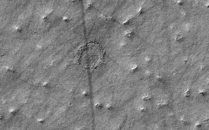 This image was acquired by NASA's Mars Reconnaissance Orbiter to take a closer look at a circular feature that might be an impact structure on the South Polar layered deposits.