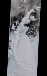 NASA's Terra spacecraft has spied a rift in Antarctica's Larsen C ice shelf, grown to 110 miles long, making it inevitable that an iceberg larger than Rhode Island will soon calve from the ice shelf.