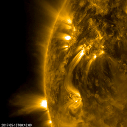 NASA's Solar Dynamics Observatory spots several bright bands of plasma connect from one active region to another, even though they are tens of thousands of miles away from each other (May 17-18, 2017).