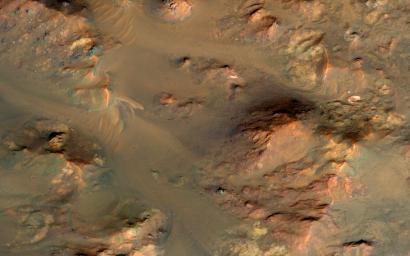 This image from NASA's Mars Reconnaissance Orbiter shows part of the central uplifted region of an impact crater more than 50 kilometers wide.