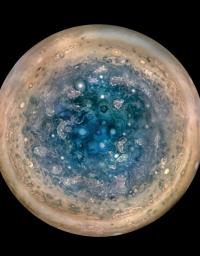 This image shows Jupiter's south pole, as seen by NASA's Juno spacecraft from an altitude of 32,000 miles (52,000 kilometers). The oval features are cyclones.