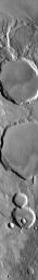 In this image, NASA's 2001 Mars Odyssey spacecraft spies what looks like a momma holding a baby.