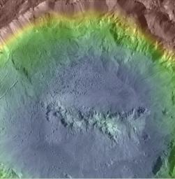 Haulani Crater is one of the youngest craters on Ceres, as evidenced by its sharp rims and bright, bluish material in this enhanced color composite topographic map from NASA's Dawn spacecraft.