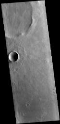 This image captured by NASA's 2001 Mars Odyssey spacecraft shows an unnamed crater in Terra Cimmeria.