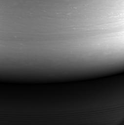 This monochrome view is the last image taken by NASA's Cassini spacecraft. It looks toward the planet's night side, lit by reflected light from the rings, and shows the location at which the spacecraft would enter the planet's atmosphere hours later.