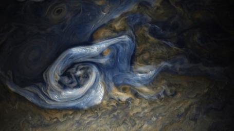 This color-enhanced image of a massive, raging storm in Jupiter's northern hemisphere was captured by NASA's Juno spacecraft during its ninth close flyby of the gas giant planet.