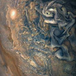 NASA's Juno spacecraft was a little more than one Earth diameter from Jupiter when it captured this mind-bending, color-enhanced view of the planet's tumultuous atmosphere.