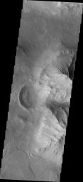 Coprates Chasma is one of the numerous canyons that make up Valles Marineris. This image captured by NASA's 2001 Mars Odyssey spacecraft is located on the eastern side of Coprates Chasma, near Capri Chasma.