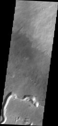 This image captured by NASA's 2001 Mars Odyssey spacecraft shows the southern flank of Pavonis Mons. Pavonis Mons is one of the three aligned Tharsis Volcanoes.