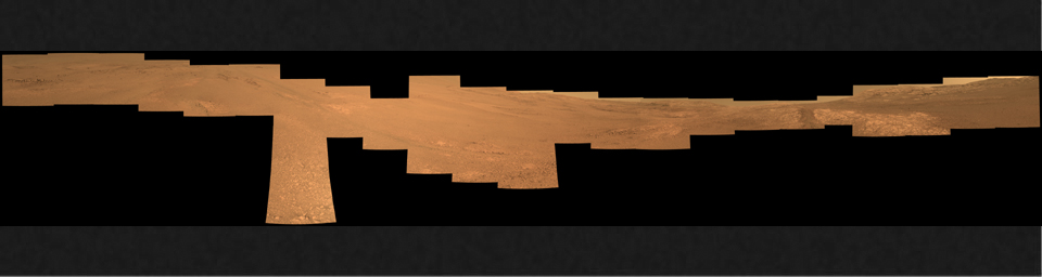 This view from within 'Perseverance Valley,' on the inner slope of the western rim of Endurance Crater on Mars, includes wheel tracks from NASA's Opportunity rover's descent of the valley.