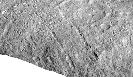 This image made with data from NASA's Dawn spacecraft shows pit chains on dwarf planet Ceres called Samhain Catenae.