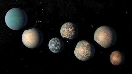 This illustration shows the seven Earth-size planets of TRAPPIST-1. The image does not show the planets' orbits to scale, but highlights possibilities for how the surfaces of these intriguing worlds might look.