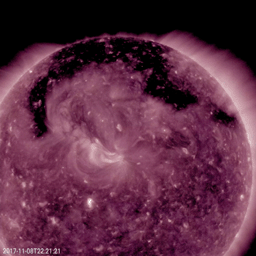 This image from NASA's Solar Dynamics Observatory shows a broad coronal hole, the dominant feature this week on the sun on Nov. 7-9, 2017. It was easily recognizable as the dark expanse across the top of the sun and extending down in each side.