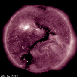 NASA's Solar Dynamics Observatory observed an elongated coronal hole (the darker area near the center) seeming to shape itself into a single, recognizable question mark over the period of one day (Dec. 21-22, 2017).