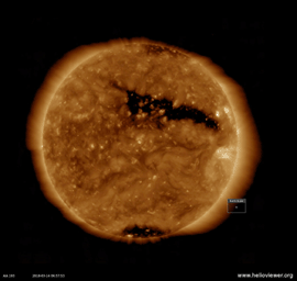 Coronal holes are areas of open magnetic fields from which solar wind rushes out into space. NASA's Solar Dynamics Observatory observed this long coronal hole that stretched out across more than half the diameter of the sun (Mar. 13-15, 2018).