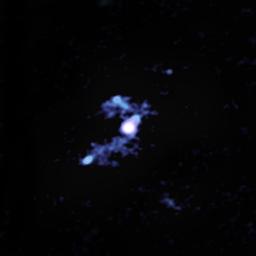 This image of galaxy W2246-0526, created using data from the Atacama Large Millimeter/submillimeter Array (ALMA), shows it is syphoning material away from three companion galaxies through trans-galactic streamers.