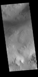 Lyot Crater is a large, complex crater in the northern lowlands of Vastitas Borealis. This image from NASA's 2001 Mars Odyssey spacecraft is located along the southern rim of the crater and shows part of the dune fields located on the floor of the crater.