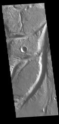 Osuga Valles is a complex set of channels located near Eos Chasma. This image was captured by NASA's 2001 Mars Odyssey spacecraft.