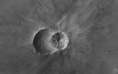 This image from NASA's Mars Reconnaissance Orbiter (MRO) shows two small impact craters located in Meridiani Planum on Mars. Small boulders on the floor and walls of the left-side crater.
