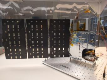 The complete TEMPEST-D spacecraft shown with the solar panels deployed.